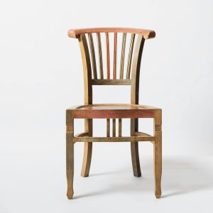 A rustic wooden chair featuring an artistic multicolor design against a white background.